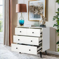 Commode à 4 tiroirs avec poignées métalliques et pieds fuselés, blanche, style moderne