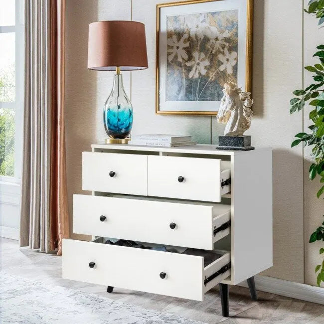 Commode à 4 tiroirs avec poignées métalliques et pieds fuselés, blanche, style moderne