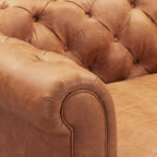 Fauteuil club Chesterfield en cuir, Madagascar Cacao / Tan Cognac, accoudoirs roulés capitonnés, 1 personne